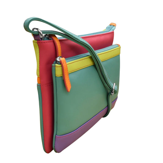 Colorful crossbody bag with multiple compartments on a white background