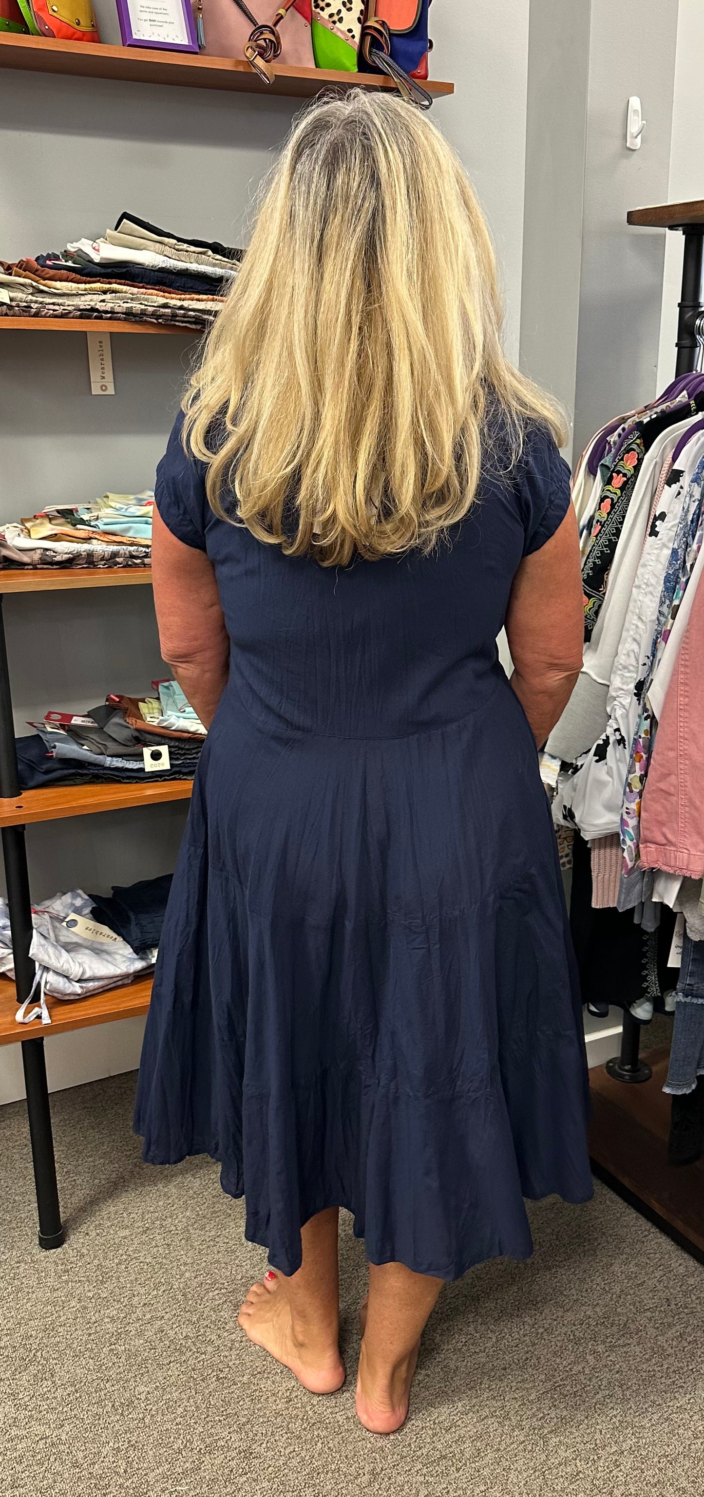 Who doesn't love dresses. This short sleeve, v-neck dress, is fun and frilly, with or without the pattern. Dress it up with a sandal or wear it with your tennis shoes. So comfy!