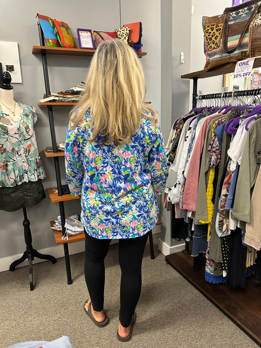 3/4 sleeve, round neck top with a variety of colors, blues, pink, lime, and turquoise in a flower pattern. Adorable on, and 100% cotton, so perfect for all year round.