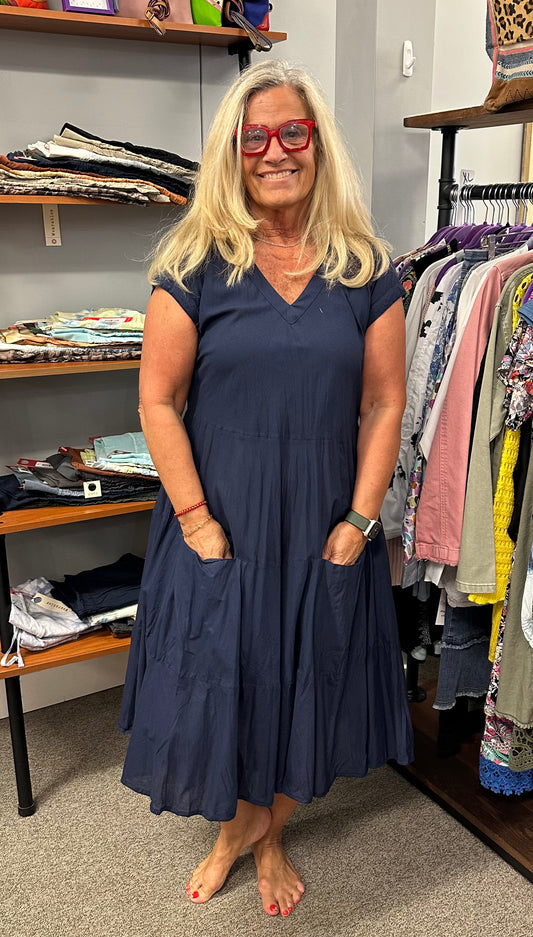 Who doesn't love dresses. This short sleeve, v-neck dress, is fun and frilly, with or without the pattern. Dress it up with a sandal or wear it with your tennis shoes. So comfy!