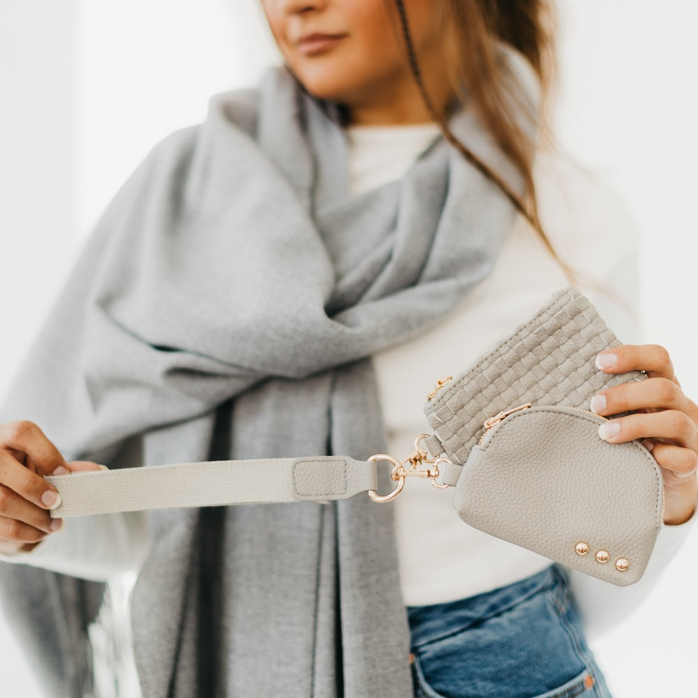 grey woven purse hand purse