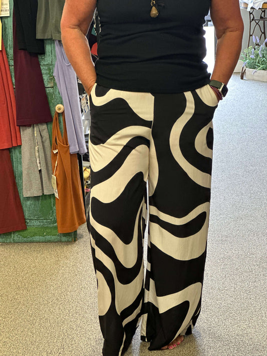 Talk about style, this pull on palazzo pant are so much fun and funky. This will look great with a short or long top in black, cream or even red. Its time to spice it up!!!!