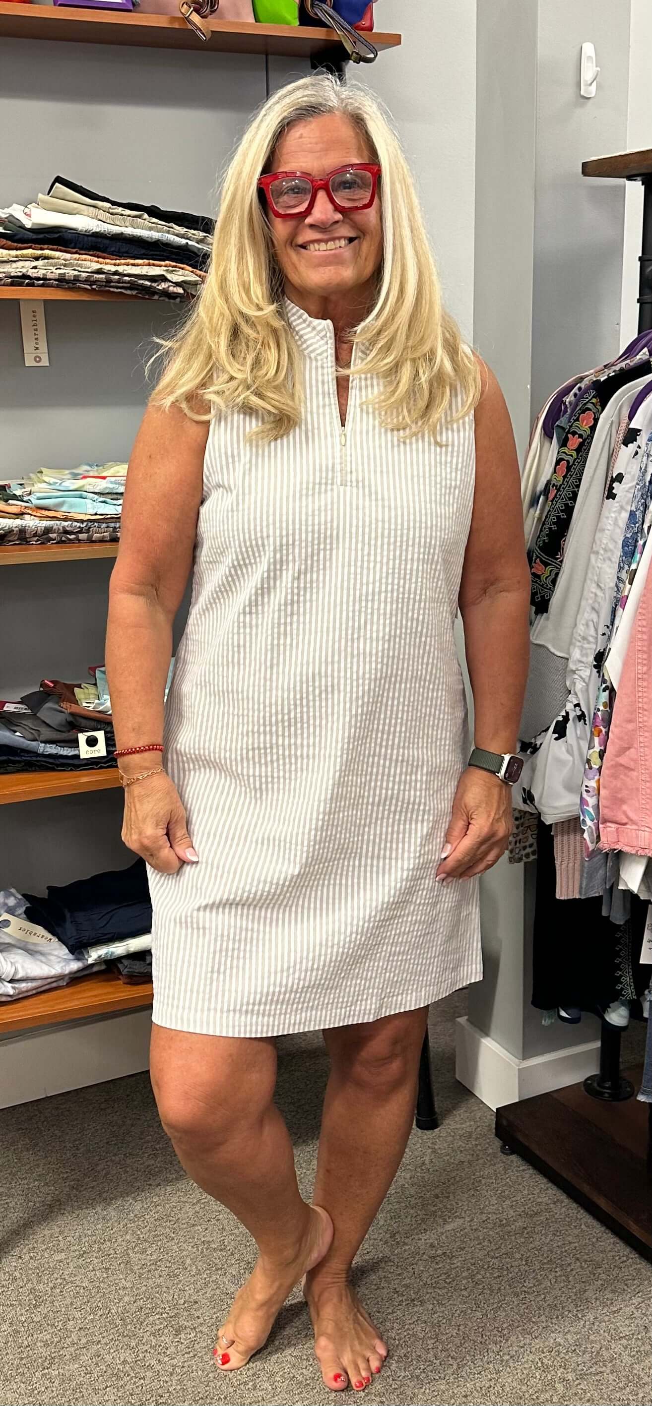 Pinstripes are back with this cute sleeveless zip neck dress. Perfect with you tennis shoes, sandals or flip flops. Super comfortable.