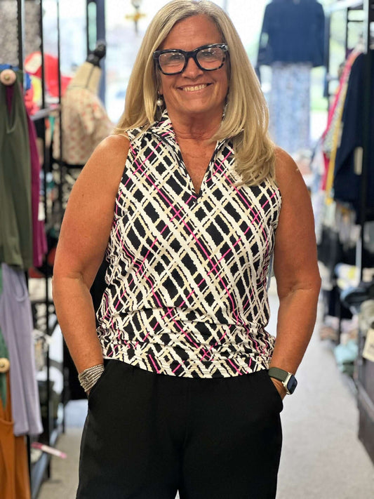 The perfect sleeveless colorful top with half zip detail. Includes UPF50+, cooling element AND ultra wicking fabric.