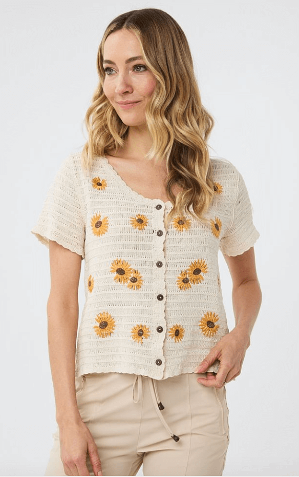 This cotton button-down short-sleeved cardigan, can be worn open or closed, with beautiful flower embroidery.