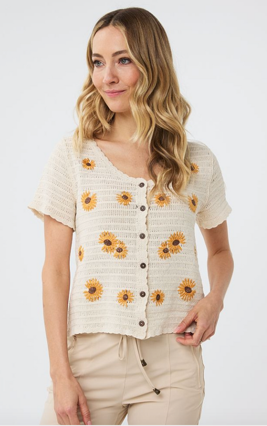 This cotton button-down short-sleeved cardigan, can be worn open or closed, with beautiful flower embroidery.