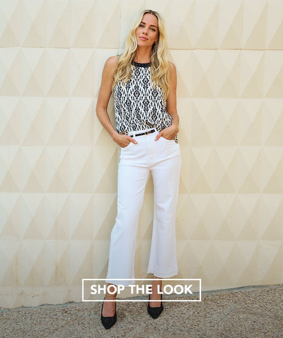 An elegant sleeveless top with tie detail at the back and pretty beads around the neckline. Easy to combine with neat pants, skirts or jeans worn tucked in or out.